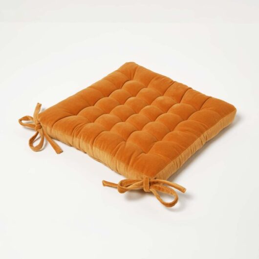 Burnt Orange Quilted Velvet Chair Pad, 40 x 40 cm - Homescapes