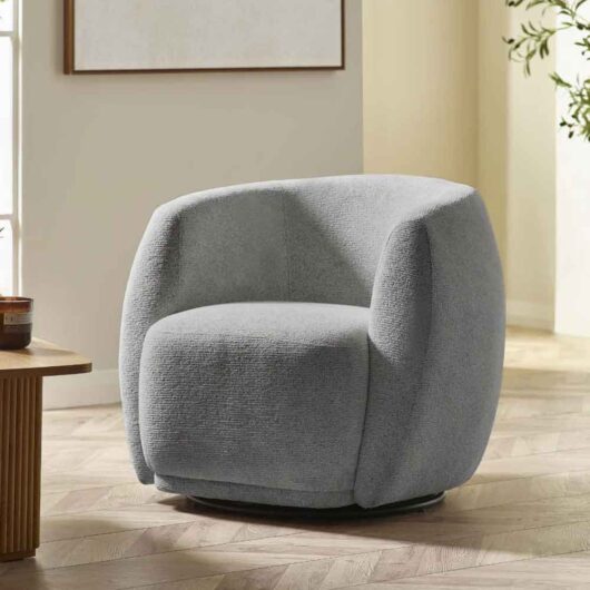 Borven Fabric Swivel Bedroom Chair in Fossil