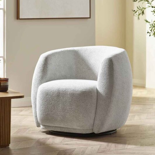 Borven Fabric Swivel Bedroom Chair in Oyster