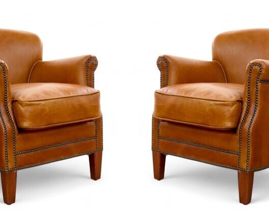 Pair Of Vintage Tan Leather Club Chairs With Nailhead Trim